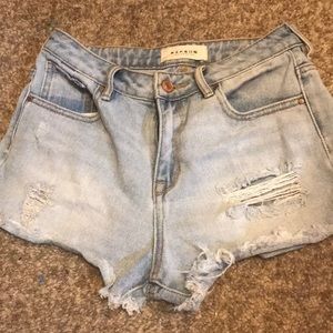 Ripped light wash jean shorts